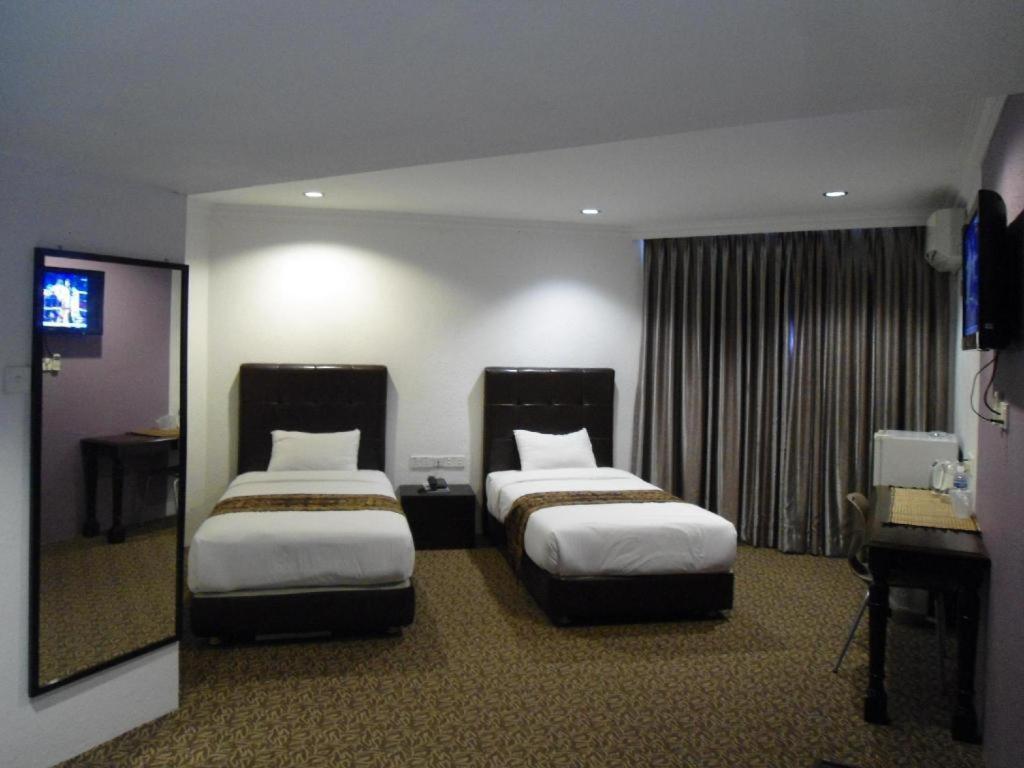 Regent Hotel Бинтулу Экстерьер фото