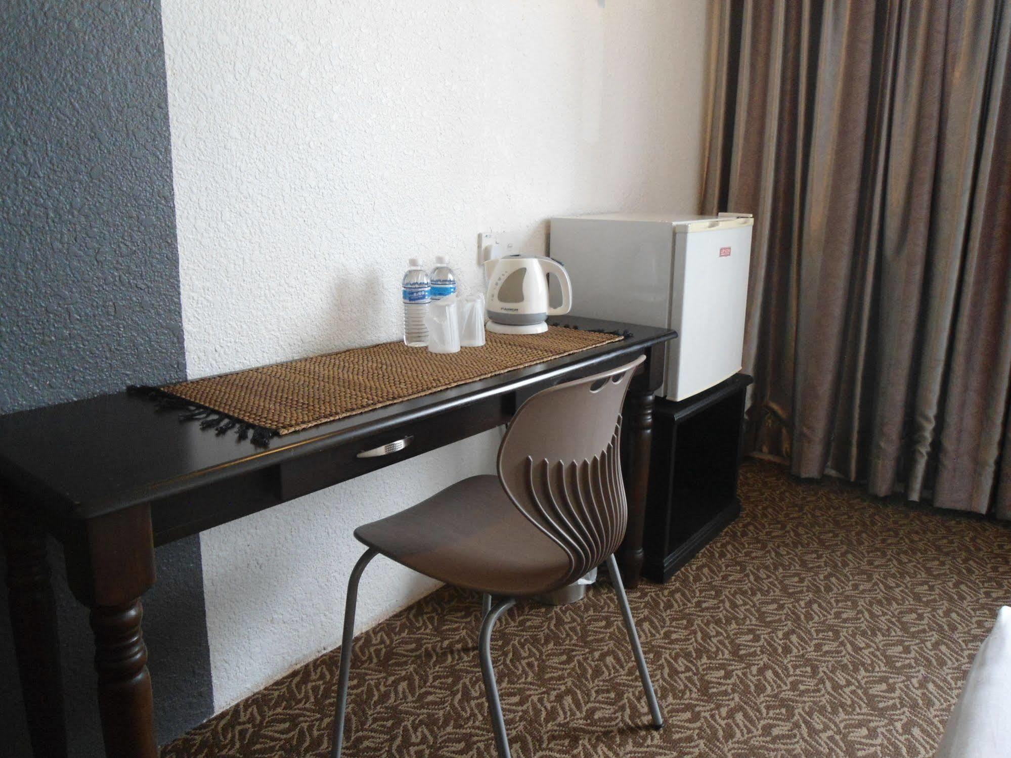 Regent Hotel Бинтулу Экстерьер фото